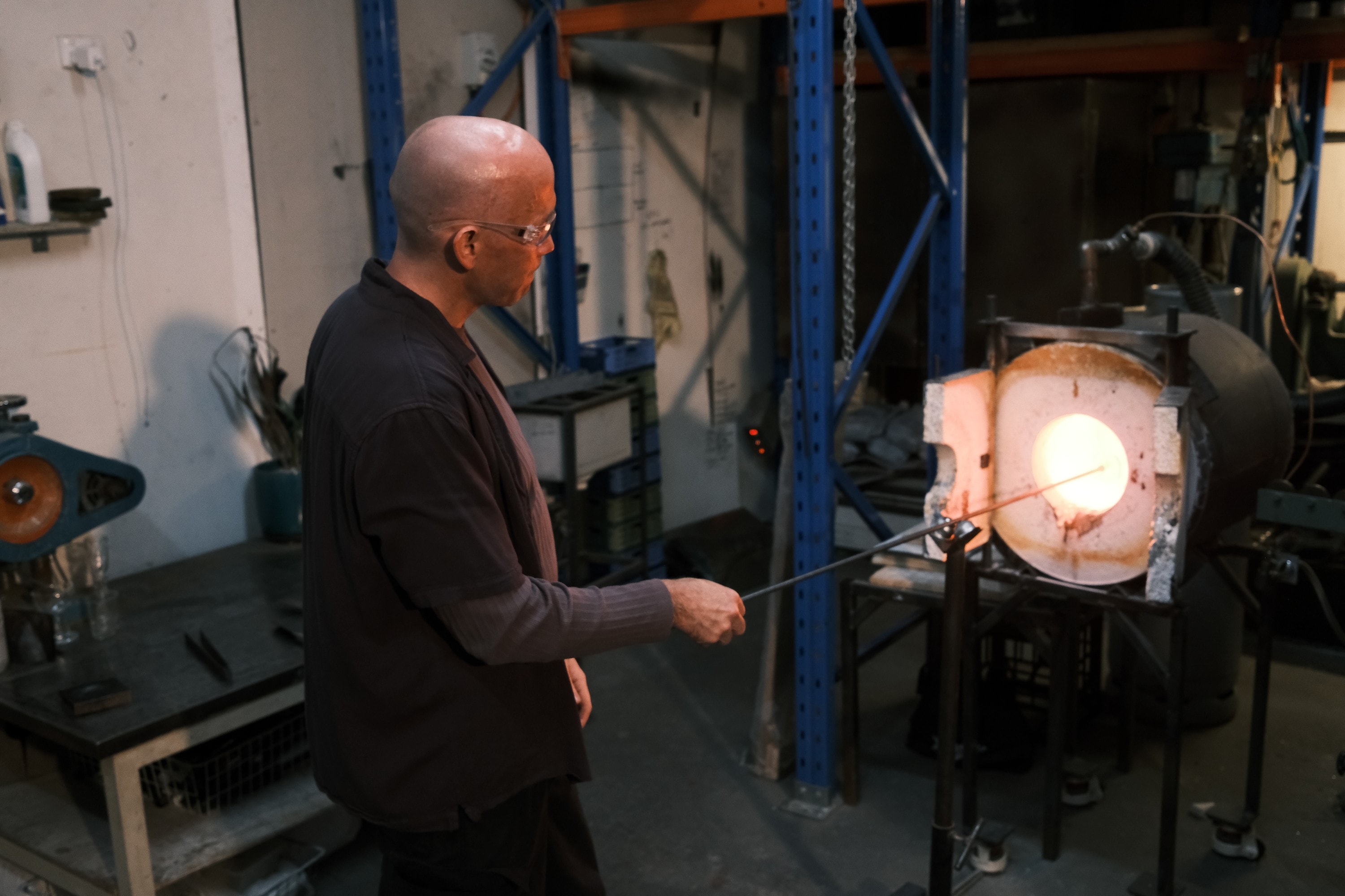 Billy reheating a piece at the glory hole
