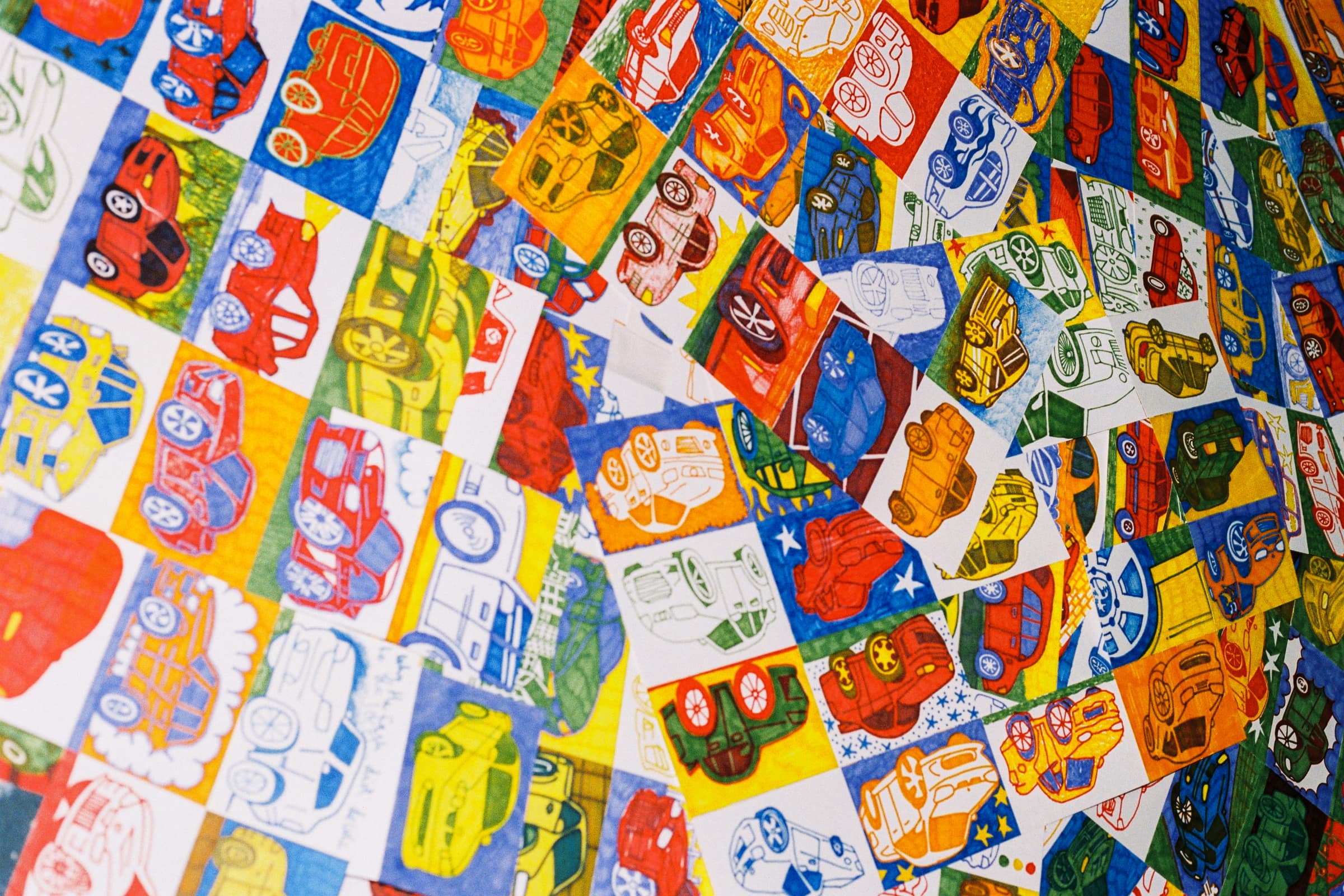 Commodore drawings in red, blue, yellow and green texta, laid edge to edge